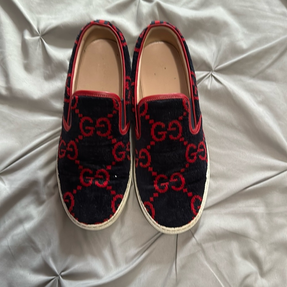 Authentic Gucci flowing red supreme slip on sneakers
